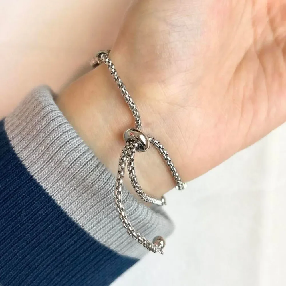 Source Unknown silver color